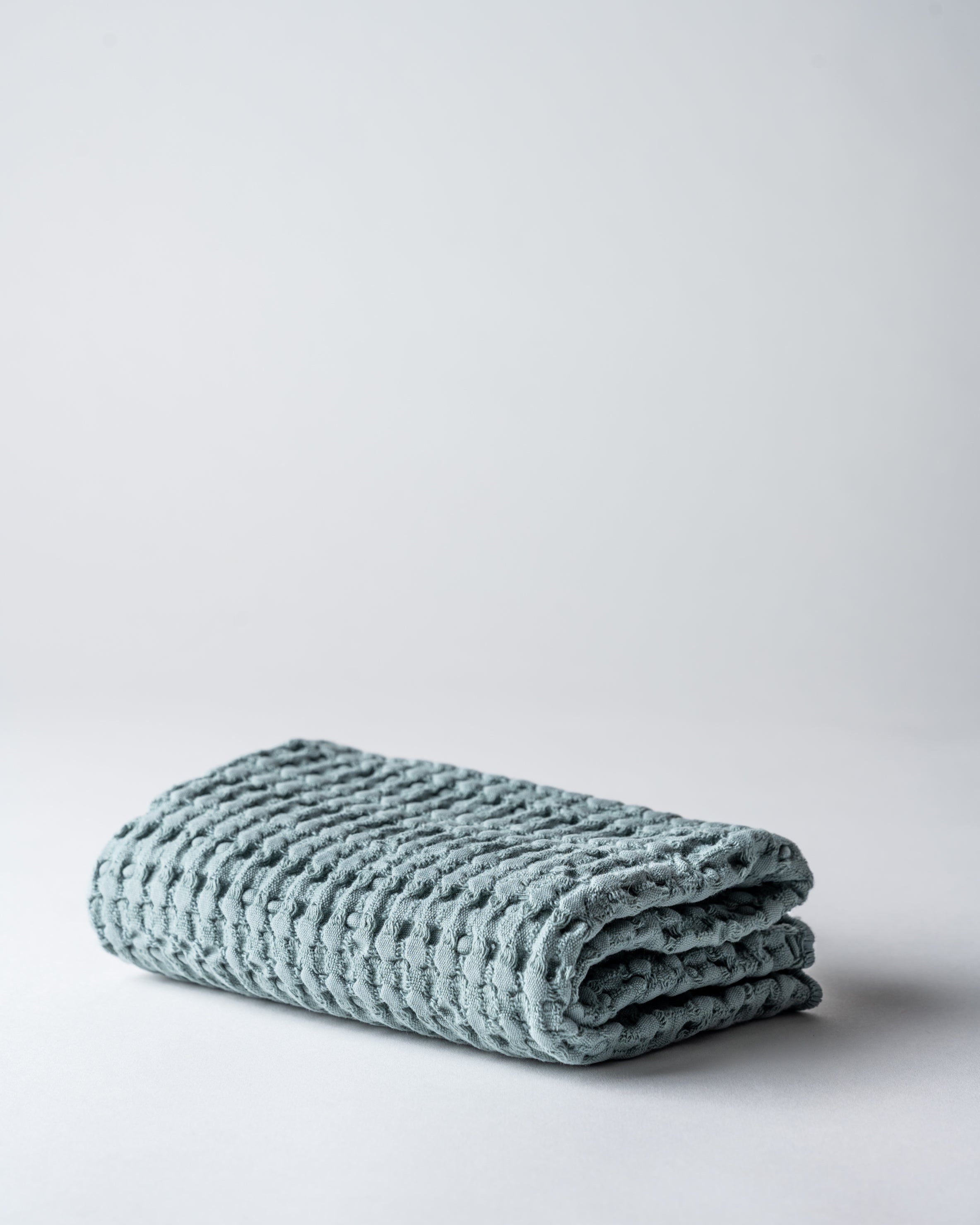 Waffeltuch Salbeigruen in Fotostudio